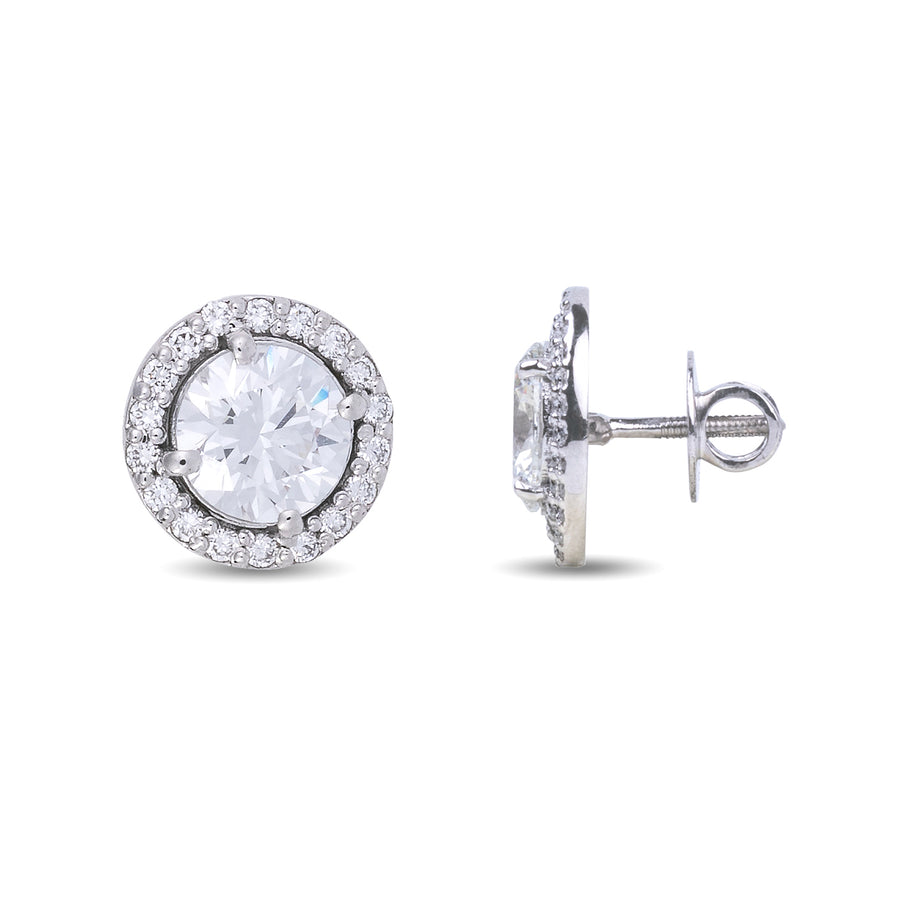 A side profile of lab grown diamond earrings showcasing the stunning halo setting that enhances the brilliance of these lab grown diamonds earrings studs. These ethically sourced lab grown diamond earring studs sparkle with exceptional clarity, making them ideal for those seeking 1 ct lab grown diamond earrings or comparable to 2 ct lab grown diamond earrings. A luxurious choice for those who love diamond stud earrings lab grown with a modern yet timeless design.