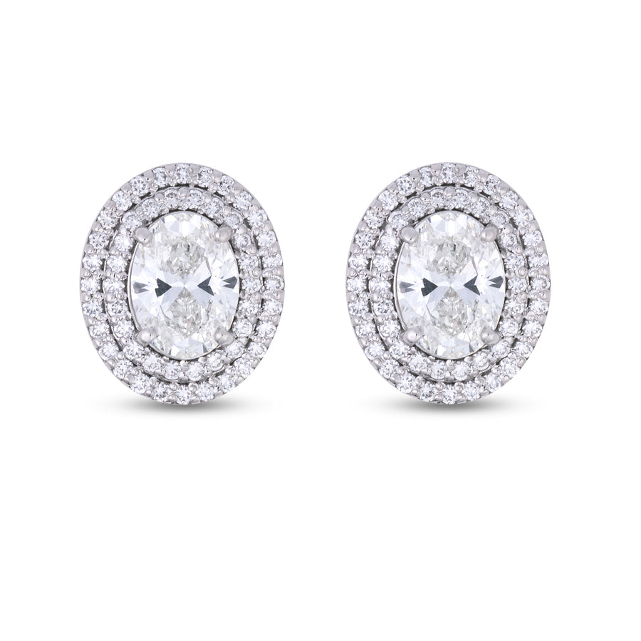 These 1.51 carat lab grown diamond stud earrings feature stunning oval-cut lab grown diamonds, encircled by a dazzling double halo to maximize brilliance. Crafted for elegance, these lab grown diamonds earrings studs offer a radiant look, making them a perfect choice for those seeking 1.5 carat lab grown diamond earrings or an alternative to 2 carat lab grown diamond earrings. Ethically sourced, they combine luxury with sustainability for the ultimate timeless style.