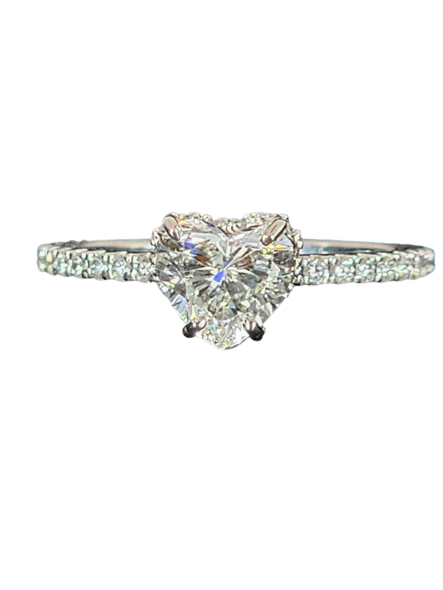 Close-up view of a 1-carat lab grown heart-shaped diamond ring, emphasizing the intricate details and sparkling facets of the diamond.

