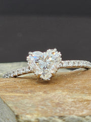 Lab grown heart shaped diamond ring 1 carat viewed from the side, highlighting the clean band and elegant diamond setting