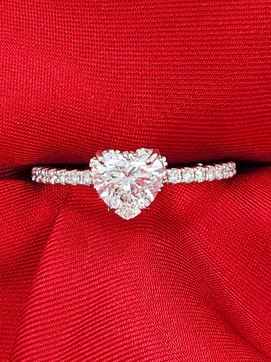 Lab grown heart shaped diamond ring in a 1 carat size, top view showing precision cut and brilliant sparkle