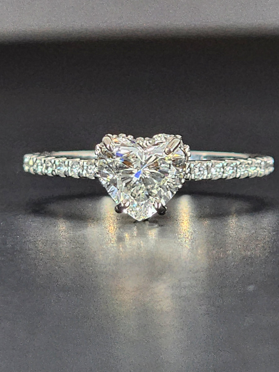Lab grown heart shaped diamond ring 1 carat viewed from the side, highlighting the clean band and elegant diamond setting
