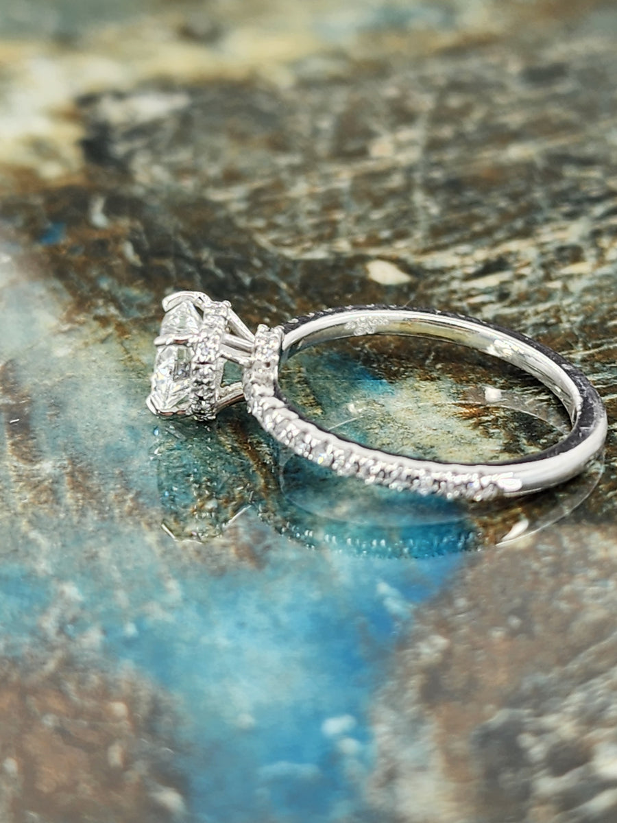 Lab grown heart shaped diamond ring 1 carat viewed from the side, highlighting the clean band and elegant diamond setting

